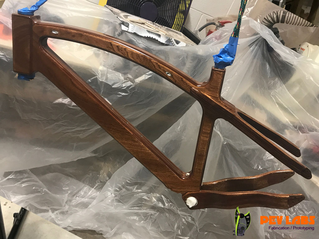 Second Coat of Gloss Epoxy Finish on Wooden E-bike Frame Gloss Epoxy Finish on Wooden E-bike Frame